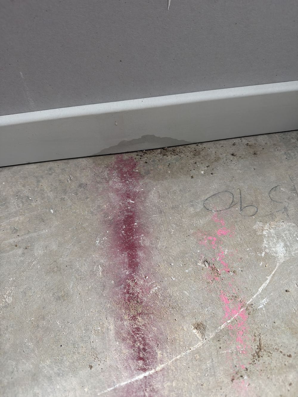 Water staining on the slab and architraves because the envelope was not yet sealed, found during a fixing stage inspection in Clyde North