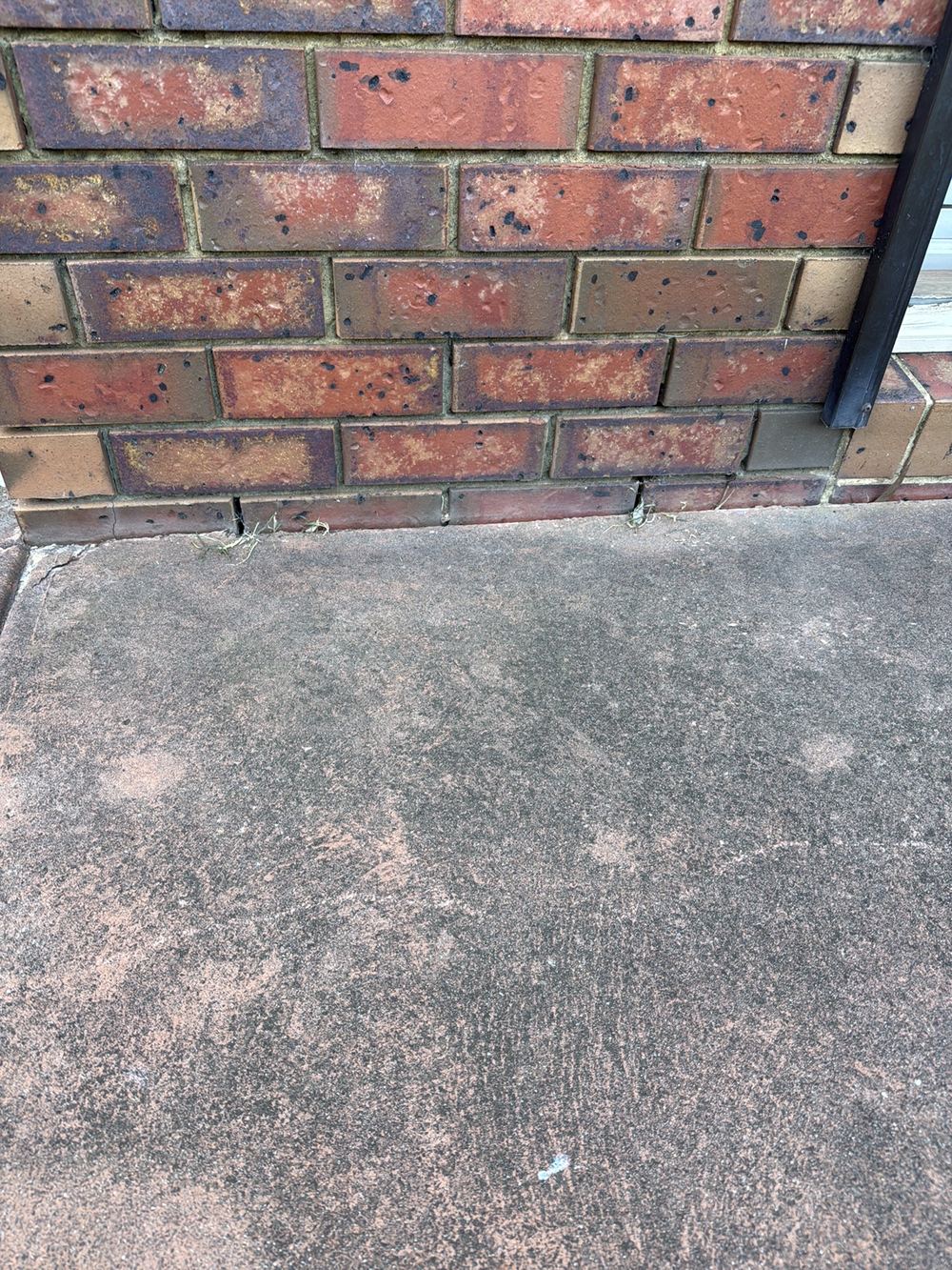 Weep holes buried by raised ground, so the wall cavity cannot drain, found during a defect investigation inspection in Aspendale Gardens